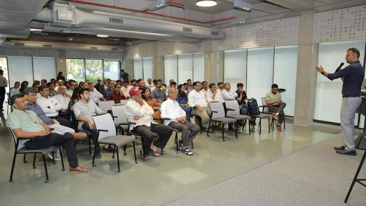 Guests listening to Siddharth Jain at Munoth’s ONE/2 conference at IIMA Ventures